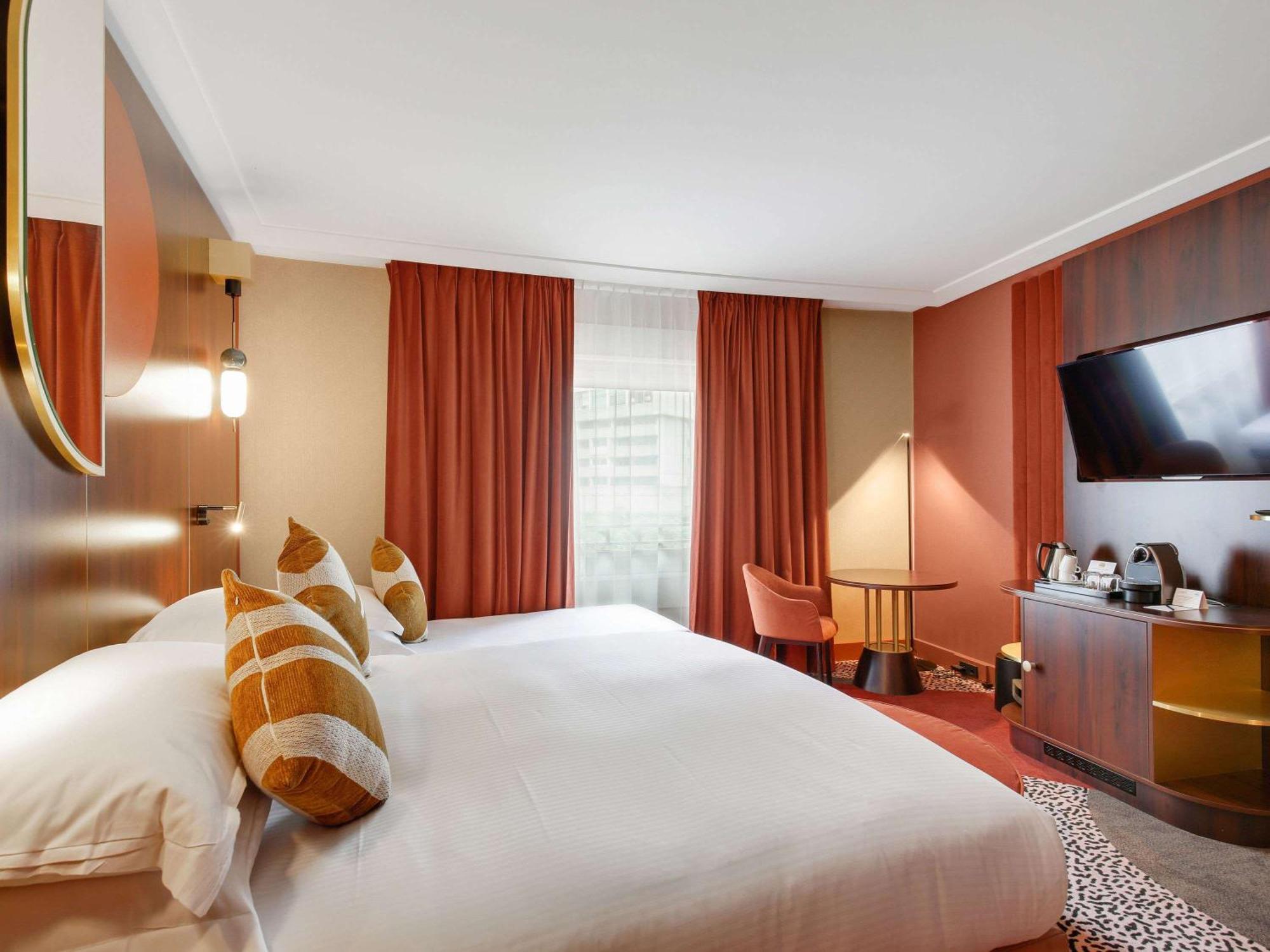 Nest Hotel Paris La Defense - Mgallery Collection بيتّو المظهر الخارجي الصورة A room at the hotel